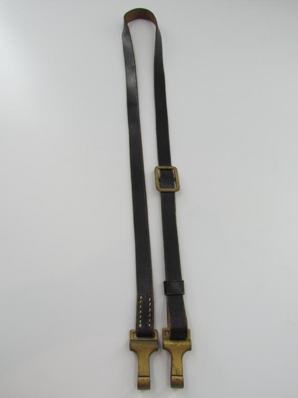 Leather shoulder strap marked DRGM