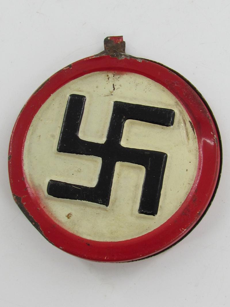 round iron shield with swastika