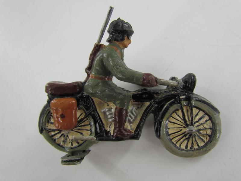 German Soldier On a Motor Bike ( Lineol )