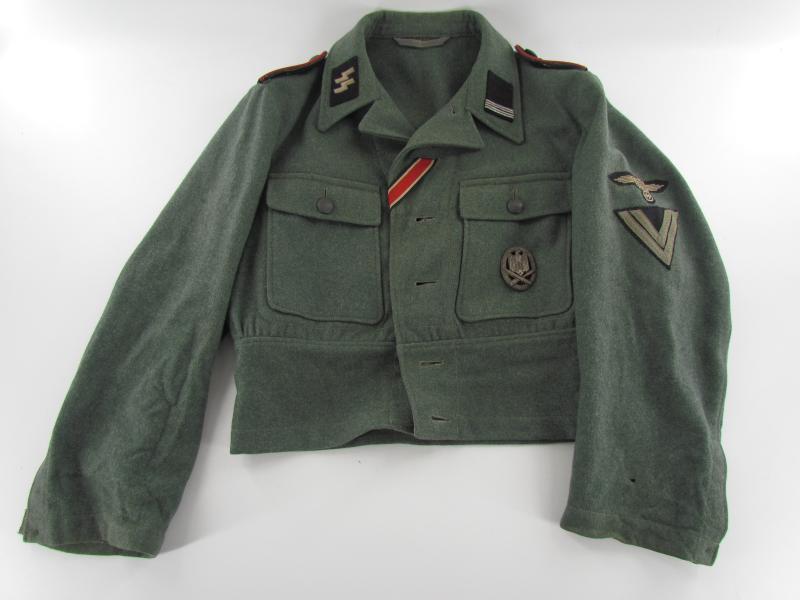 Waffen SS M44 Artillery tunic in the rank of SS-Röttenfuhrer