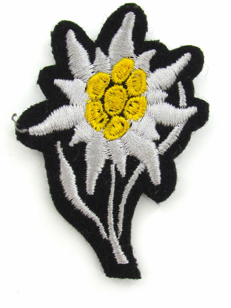 Waffen SS 'Gebirgsjäger' Edelweiss cloth cap badge