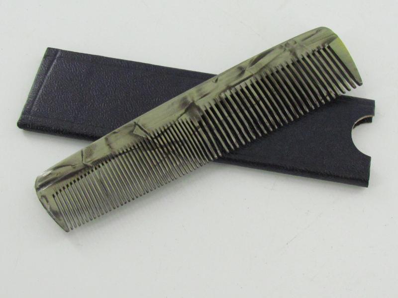 WWII era comb in protective cover